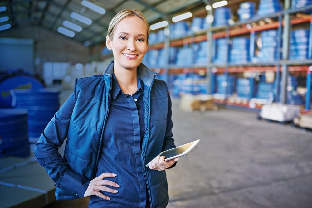 female Warehouse worker on iPad