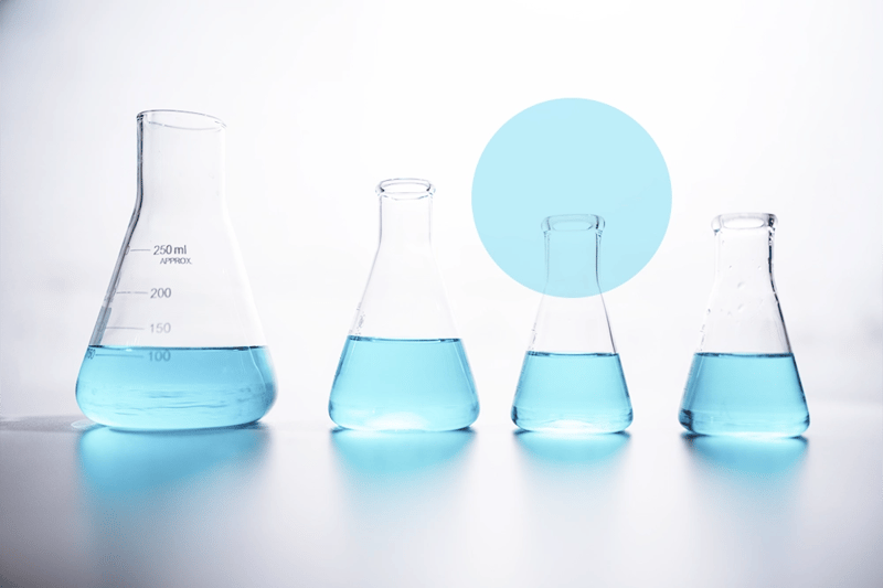 beakers with blue liquid