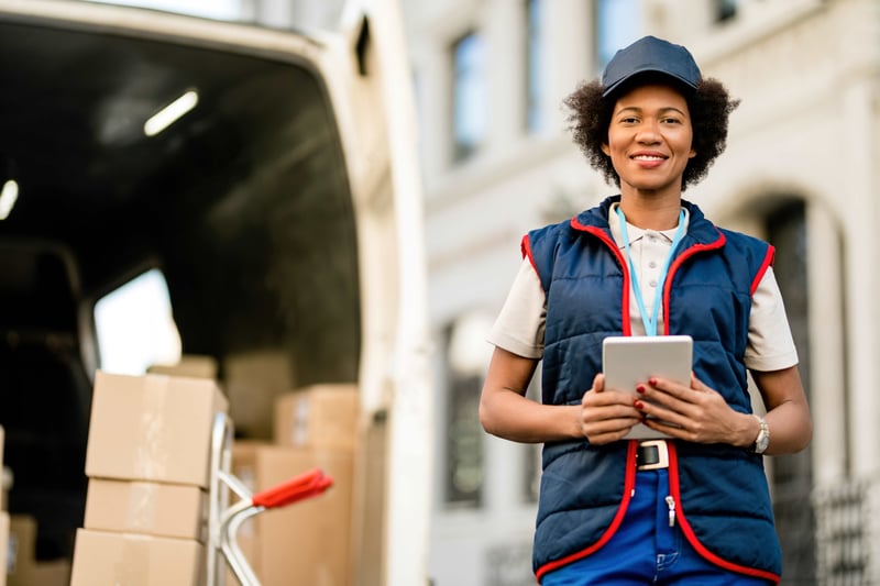 portrait-of-happy-african-american-delivery-woman-2024-12-13-18-35-14-utc